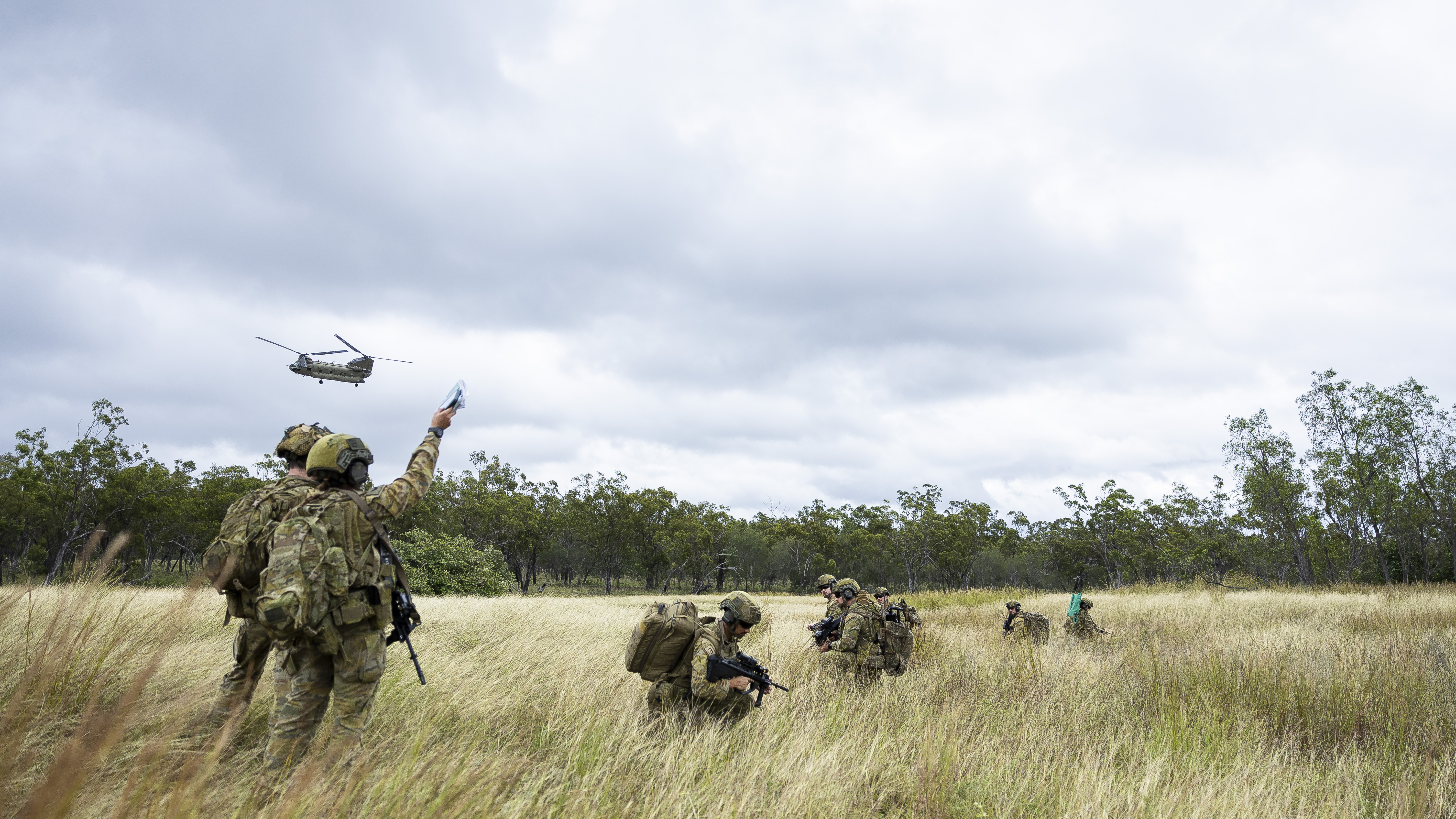 ADF members with helicopter during field exercise